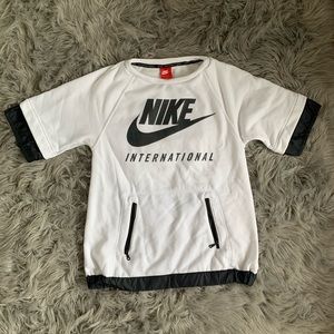 Never worn Nike short sleeve sweatshirt